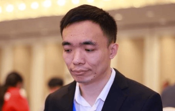 Cao Yanlei at the board.
